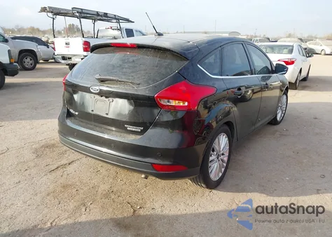 2016 Ford Focus Titanium z USA, uszkodzony, nr VIN 1FADP3N27GL374838